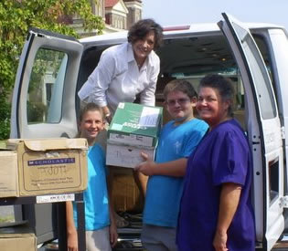 From left to right, Malaina Wamble, Lee Aylward, Delta State Delta Center, Landon Tucker, and Elissa Tucker, director of the Rolling Fork library.